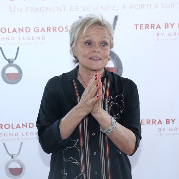 Son épouse, l'humoriste et actrice de 70 ans Muriel Robin, était évidemment présente au premier rang pour lui afficher fièrement son soutien inconditionnel.

Exclusif - Muriel Robin et Anne L. remercient tous ceux qui les ont aidé à réaliser ce Collier " Terra by Roland Garros ", au restaurant Laurent à Paris, France le 22 Mai 2026.

© Bertrand Rindoff/Bestimage