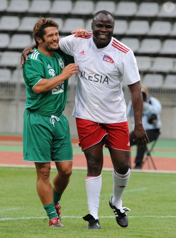 Bixente Lizarazu et Basile Boli - Match pour Thierry Roland et pour les 80 ans du football professionnel. Match de Gala, opposant le Varietes Club de France à la selection republicaine au Stade Charlety a Paris le 12 Septembre 2012.