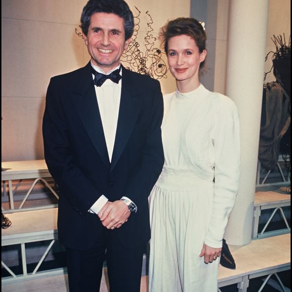 Claude Lelouch et sa femme Marie-Sophie L. et Jean-Paul Belmondo à Paris en 1988. ©Bestimage
