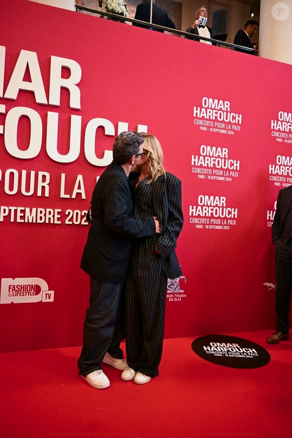 Marc Lavoine et sa compagne Adriana Karembeu au photocall du "concerto pour la paix" de Omar Harfouch au Théâtre des Champs-Elysées à Paris le 18 septembre 2024.

© Perusseau / Tribeca / Bestimage