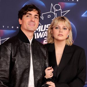 Florian Rossi et sa compagne Louane Emera au photocall de la 25ème cérémonie des "NRJ Music Awards (NMA)" au palais des Festivals et des Congrès de Cannes, France. © Dominique Jacovides/Bestimage
