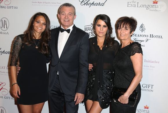 Karine Ferri et les parents de Gregory Lemarchal Pierre, Laurence et la soeur Leslie lors du  'Global Gift Gala' au George V le 13 Mai 2013 à Paris.

Agence / Bestimage