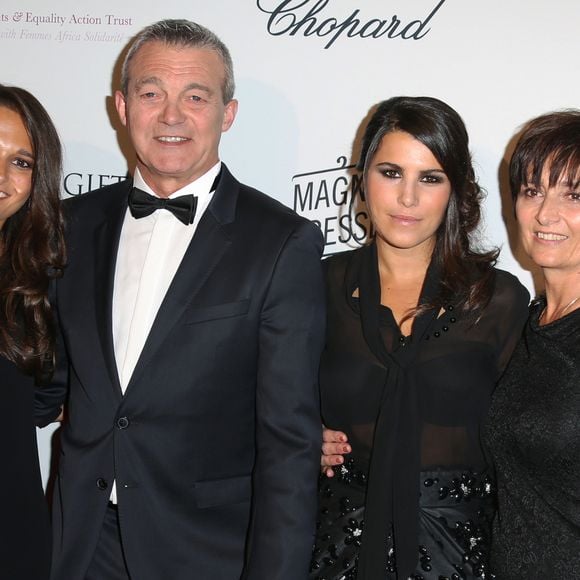 Karine Ferri et les parents de Gregory Lemarchal Pierre, Laurence et la soeur Leslie lors du  'Global Gift Gala' au George V le 13 Mai 2013 à Paris.

Agence / Bestimage
