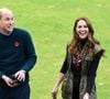 À l'instar de Jaguar, Rigby & Peller, ou Floris, Barbour fait partie des marques distinguées par la famille royale britannique. 

Le prince William et Kate Middleton rendent visitent aux scouts à Alexandra Park pour leur campagne © Mirrorpix / Bestimage