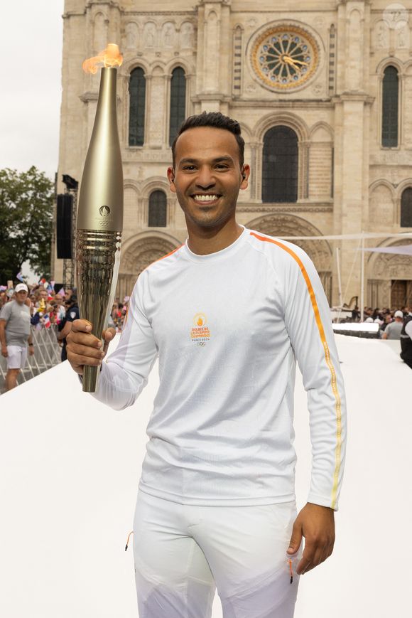 Mohamed Bouhafsi - Les célébrités participent aux étapes finales du relais de la Flamme Olympique à Saint-Denis (JO), le 26 juillet 2024. © Jeremy Melloul - Jack Tribeca /Bestimage