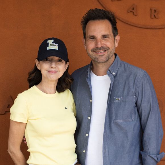 Christophe Michalak et Delphine McCarty au Village lors des Internationaux de France de Tennis de Roland Garros 2025 (Jour 9), le 3 juin 2025 à Paris Moreau / Jacovides / Bestimage