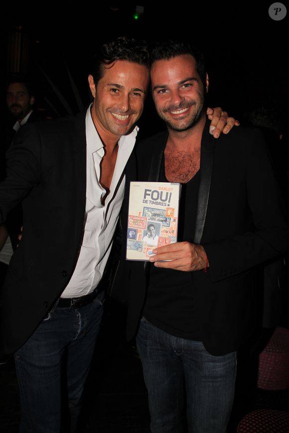 Thomas Darlet et Cédric Anthony ( fils de Richard Anthony) - Thomas Darlet présente son livre "Fou de Timbres" au Buddha Bar le 19 septembre 2014. BALDINI / BESTIMAGE