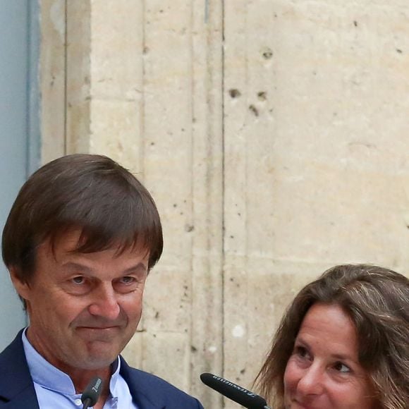Florence Lasserre, la femme de Nicolas Hulot - Passation de pouvoir entre le ministre de la Transition Ecologique et Solidaire, Nicolas Hulot (et sa femme) et son successeur François de Rugy, au ministère de l'Ecologie, hôtel de Roquelaure, à Paris, le 4 septembre 2018.  © Stéphane Lemouton / Bestimage