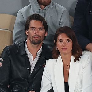 Camille Lacourt et sa compagne Alice Detollenaere dans les tribunes lors des Internationaux de France à Roland Garros à Paris, France. Photo by Nasser Berzane/ABACAPRESS.COM
