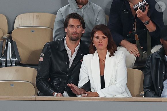 Camille Lacourt et sa compagne Alice Detollenaere dans les tribunes lors des Internationaux de France à Roland Garros à Paris, France. Photo by Nasser Berzane/ABACAPRESS.COM