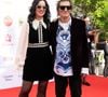 Sur un premier cliché, on voit le couple enlacé devant la tour Eiffel scintillante, 

Sally Humphreys Wood and Ronnie Wood at The King's Trust 50th Anniversary Celebration held on May 11, 2026 at the Royal Albert Hall in London, England, UK. | 00754706