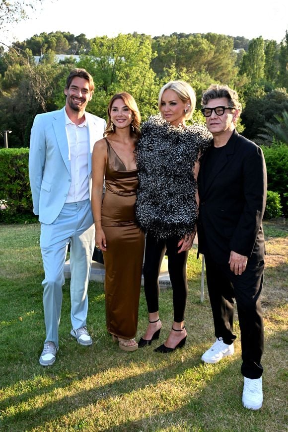 Camille Lacourt et sa compagne Alice Detollenaere, Adriana Karembeu et son compagnon Marc Lavoine  le 21 juin 2025.
Photo par Bruno Bebert/Bestimage