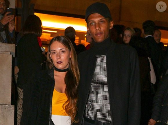 Le chanteur Stromae et sa femme Coralie Barbier - Défilé de mode "Kenzo" collection prêt-à-porter Printemps-Eté 2017 lors de la Fashion Week de Paris à la Cité de l'architecture et du patrimoine au Trocadéro à Paris, France, le 4 octobre 2016. © Agence/Bestimage