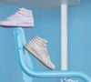 Une collaboration surprise avec un géant du sportswear a également été dévoilée sur le podium.

Une fois de plus, l'artiste primé a retravaillé avec Reebok le cuir classique et présente maintenant le cuir classique x Cardi B V2. 

© Bestimage