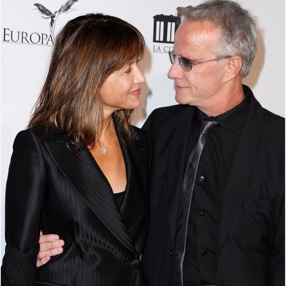Sophie Marceau etChristophe Lambert - Arrivee des people au defile Giorgio Armani Haute Couture Printemps/Ete 2014 au Palais de Tokyo a Paris, le 21 janvier 2014. © VEEREN / BESTIMAGE