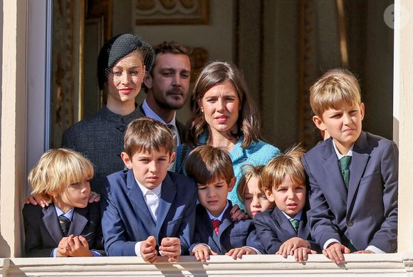 Stefano Ercole Carlo Casiraghi, Beatrice Borromeo, Pierre Casiraghi, Raphael Elmaleh, Charlotte Casiraghi, Balthazar Casiraghi-Rassam, Francesco Carlo Albert Casiraghi, Maximilian Casiraghi and Sacha Casiraghi - La famille princière de Monaco au balcon du palais, à l'occasion de la Fête Nationale de Monaco, le 19 novembre 2024. © Jacovides-Bebert/Bestimage