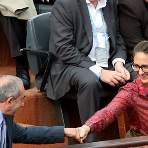 Jean Gachassin et Mary Pierce dans les tribunes de Roland Garros le 26 mai 2016. © Dominique Jacovides / Bestimage