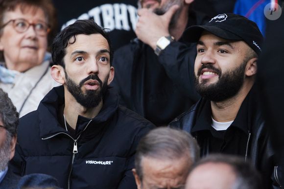 BigFlo et Oli - Célébrités dans les tribunes de la demi-finale retour de Ligue des champions entre le PSG face au Borussia Dortmund (0-1) au Parc des Princes à Paris le 7 mai 2024. © Cyril Moreau/Bestimage