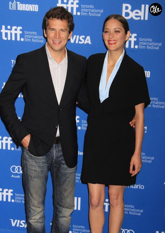 Guillaume Canet et Marion Cotillard (habillee en Dior Haute Couture) - Photocall du film "Blood Ties" au festival du Film de Toronto le 10 septembre 2013. ©Bestimage