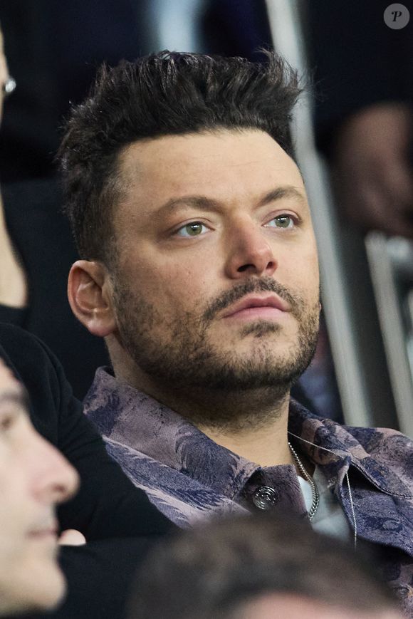 Kev Adams - Célébrités assistent au 1/8e de finale aller de la Ligue des champions 2024-25 entre le PSG contre Liverpool (0-1) au Parc des Princes à Paris le 5 mars 2025. © Cyril Moreau/Bestimage