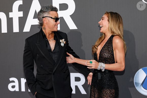 Robbie Williams et sa femme Ayda Field - Photocall du gala " amfAR 2026 by Chopard " à l'Hôtel du Cap-Eden-Roc à Antibes, lors du 79ème Festival International du Film de Cannes. Le 21 mai 2026
© Jacovides-Moreau / Bestimage