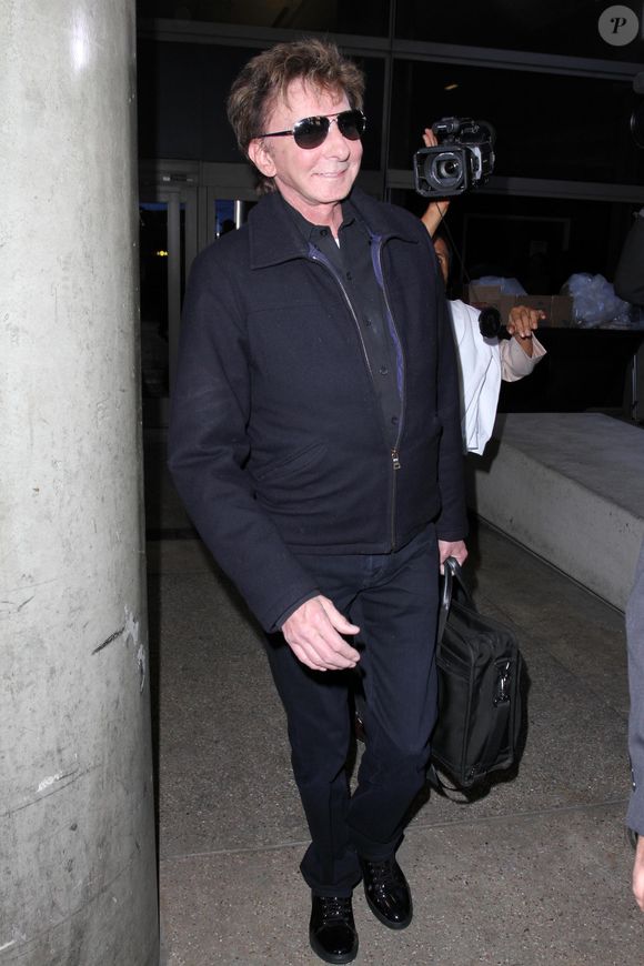 Barry Manilow arrive à Los Angeles, le 26 novembre 2014.

Photo : Abaca