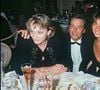Archives - Patricia Kaas, Alain Delon et Marie Fugain lors de la soirée pour le lancement du champagne "Alain Delon" en 1990 à Paris.@ANGELI-RINDOFF / BESTIMAGE