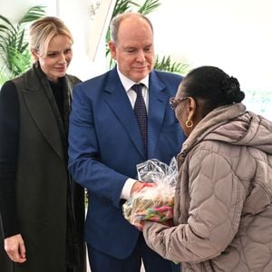 Le prince Albert II de Monaco, sa femme la princesse Charlene et Camille Gottlieb ont remis les traditionnels colis de Noël aux aînés monégasques dans la meeting room du Yacht Club de Monaco dans le cadre de festivités de fin d'année de la Principauté de Monaco, le 12 décembre 2024. © Bruno Bebert/Pool Monaco/Bestimage