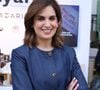 On y découvre notamment la petite fille embrassant son frère, les deux enfants allongés côte à côte ou encore le bébé avec de grandes lunettes de soleil.

Sonia Mabrouk  - Festival du Livre de Paris 2025 au Grand Palais à Paris le 11 avril 2025.

© Denis Guignebourg / Bestimage