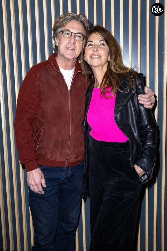 François Cluzet et sa femme Narjiss Slaoui-Falcoz - Avant Première Parisienne du film «Seule la terre est éternelle » à l'UGC Danton le 22 mars 2022. © Olivier Borde / Bestimage