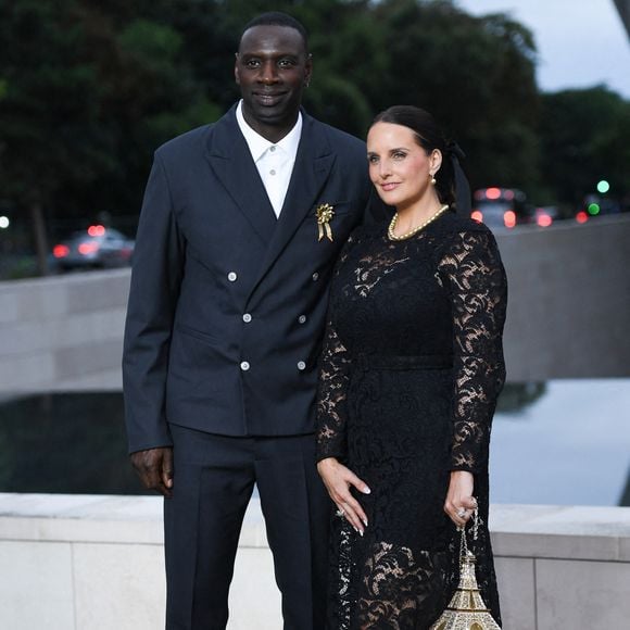 Omar Sy et Hélène Sy assistent au prélude des Jeux de Paris 2024 à la Fondation Vuitton, le 25 juillet 2024. Photo : Aurore Marechal/ABACAPRESS.COM