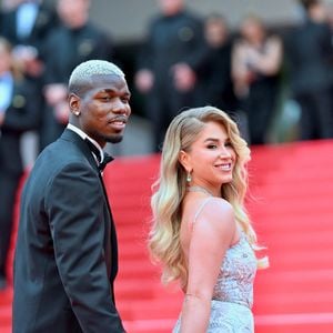 "Les problèmes de Paul étaient publics. Ça nous a affectés, nous, en tant que couple. Ça a affecté nos enfants" a-t-elle toutefois admis.

Zulay Pogba et Paul Pogba assistent au tapis rouge de Highest 2 Lowest lors de la 78ème édition du Festival de Cannes au Palais des Festivals le 19 mai 2025 à Cannes, France. Photo par Franck Castel/ABACAPRESS.COM