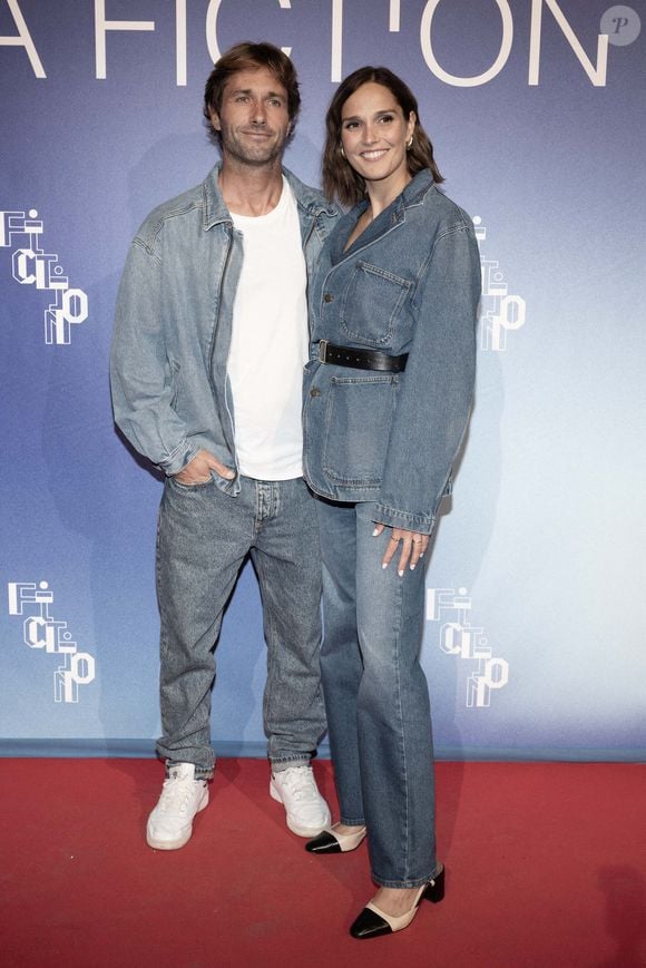 Camille Lou et son fiancé Romain Laulhe assistent au photocall de Cats Eyes lors du 26ème Festival de la Fiction de La Rochelle, le 12 septembre 2024 à La Rochelle, France. Photo by David NIVIERE/ABACAPRESS.COM