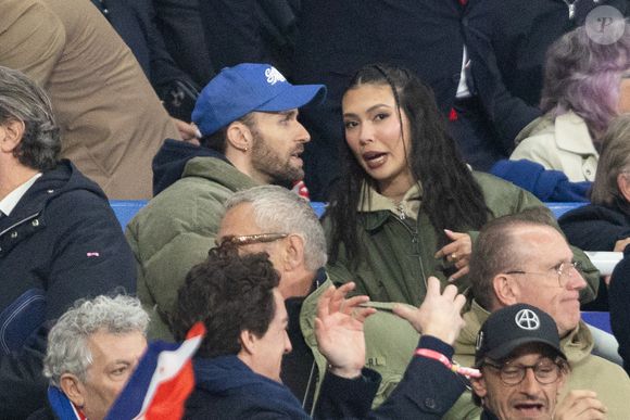 Squeezie et Chloé Gervais au match de rugby du Tournoi des Six Nations France contre Angleterre au Stade de France à Saint-Denis le 14 mars 2026. © AGENCE / BESTIMAGE