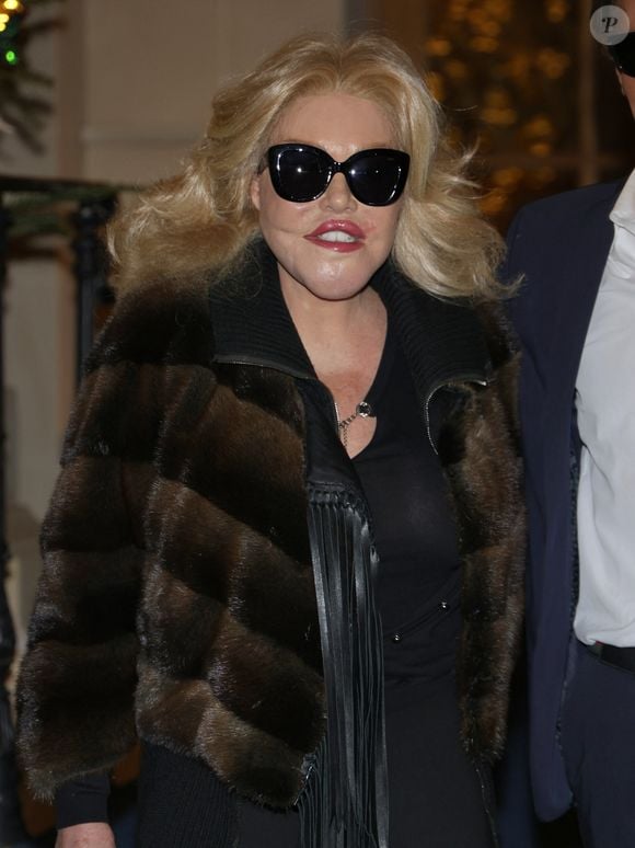 Paris, FRANCE  - Jocelyn Wildenstein and Lloyd Klein pose for our cameras as the famous couple arrive for dinner at the fancy Ritz Paris.



Pictured: Jocelyne Wildenstein