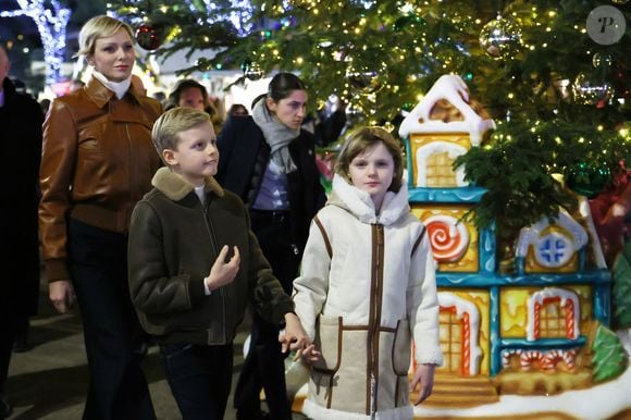 La princesse Charlene de Monaco avec ses enfants, le prince héréditaire Jacques et la princesse Gabriella, a Inauguré le traditionnel Marché de Noël de Monaco, le 6 décembre 2024. Ils étaient accompagné par le nouveau ministre d'Etat de la Principauté © JC VINAJ / Pool Monaco / Bestimage