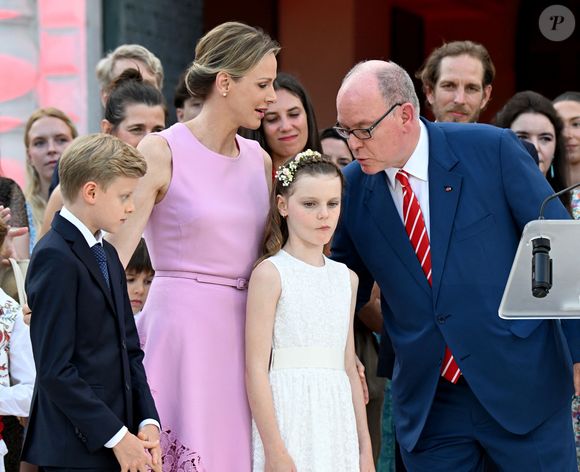 Le prince Albert II de Monaco, la princesse Charlene et leurs enfants, le prince héréditaire Jacques et la princesse Gabriella - Célébration des 20 ans de règne du prince souverain Albert II de Monaco sur la place du Palais à Monaco, le 19 juillet 2025. © Bruno Bebert/Bestimage
