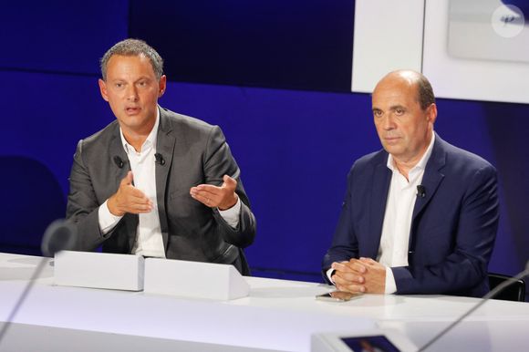 Marc-Olivier Fogiel (directeur général de BFMTV), Hervé Beroud (directeur général délégué de Altice Média, chargé de l' information et du sport) - Conférence de presse de rentrée de BFMTV saison 2021/2022 à l'Altice Campus à Paris, France, le 25 août 2021. © Christophe Clovis/Bestimage