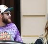 Selon Closer, les choses semblent aller mieux entre les amoureux, puisque la jeune femme a accepté de lui donner une seconde chance.
René-Charles Angélil, porte un t-shirt Outkast, et sa compagne Angelique Weckenmann à la sortie de l'hôtel Royal Monceau avant l'ouverture des Jeux Olympiques (JO) Paris 2024 à à Paris, France, le 24 juillet 2024. © Backgrid USA / Bestimage