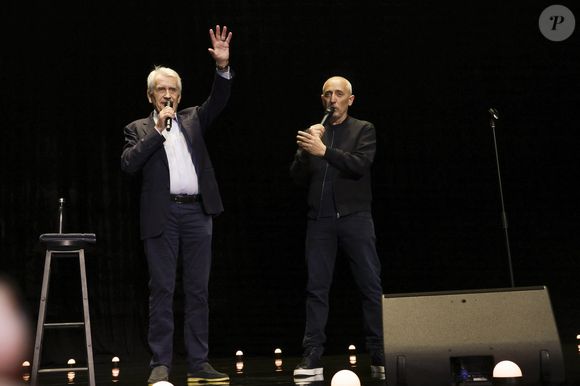 Exclusif - Gad Elmaleh célèbre les cinquante ans de carrière de Gilbert Coullier sur la scène du Zenith de Rouen à la fin de son spectacle "Lui même" 
Le 28 mars 2025. © Jack Tribeca / Bestimage