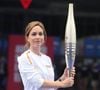 L’ancienne championne de patinage artistique s’est déclarée candidate, affirmant ne pas avoir peur des défis.

Florent Manaudou, Melina Robert-Michon, David Lappartient, Nathalie Pechalat lors du relais de la Flamme Olympique au Club France à Paris, le 26 juillet 2024. Dppi / Panoramic / Bestimage