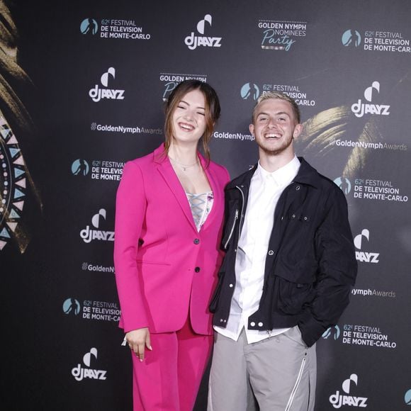 Elsa Bois et Michou au photocall de la soirée des nominées 'Golden Nymph nominées party' lors du 62ème Festival de Télévision de Monte-Carlo, à Monaco, le 20 Juin 2023. 
© Denis Guignebourg/BestImage