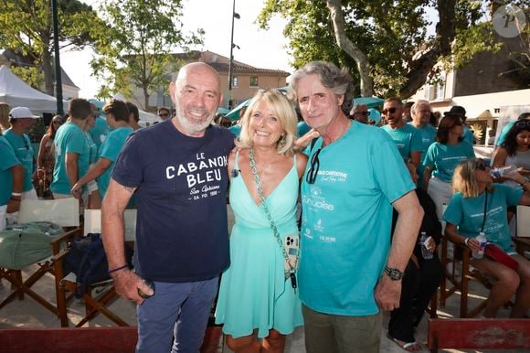 Philippe Corti, Pascale Perez ( directrice de l'agence Sun 7 Graphic et éditrice du magazine Turquoise Saint-Tropez ), Gérald Passedat lors de la 6ème édition du tournoi de pétanque caritative Turquoise place des lices au profit pour la deuxième année de l’association soleil d’enfance.
Saint-Tropez, le 10 août 2025.

© Jack Tribeca / Bestimage