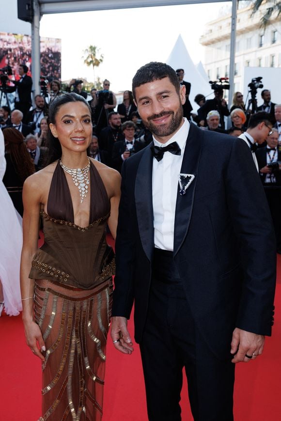 Cyril Benzaquen et sa femme Amel - Montée des marches pour la cérémonie de clôture du 79ème Festival International du Film de Cannes, le 23 mai 2026. © Jacovides-Moreau / Bestimage