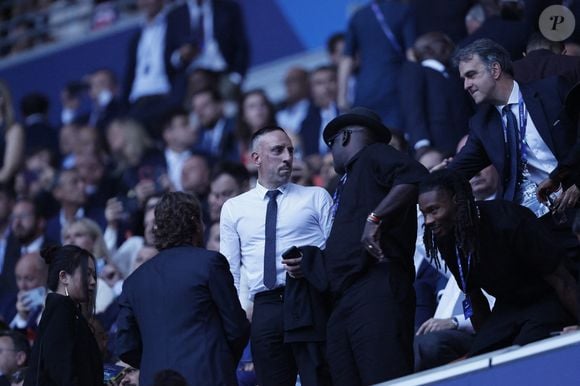Franck Ribéry et Lilian Thuram - Les célébrités dans les tribunes de la finale de la Ligue Des Champions 2025 "PSG - Inter Milan (5-0)" à l'Allianz Arena de Munich, le 31 mai 2025.
© Cyril Moreau/Bestimage