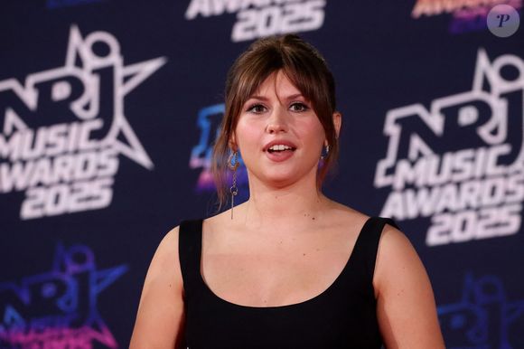 Elle revient sur sa prestation marquante sur le titre “All by Myself”, qui a marqué la saison.

Marine Delplace au photocall de la 27ème édition des NRJ Music Awards au palais des Festivals de Cannes, France, le 31 octobre 2025. © Dominique Jacovides/Bestimage