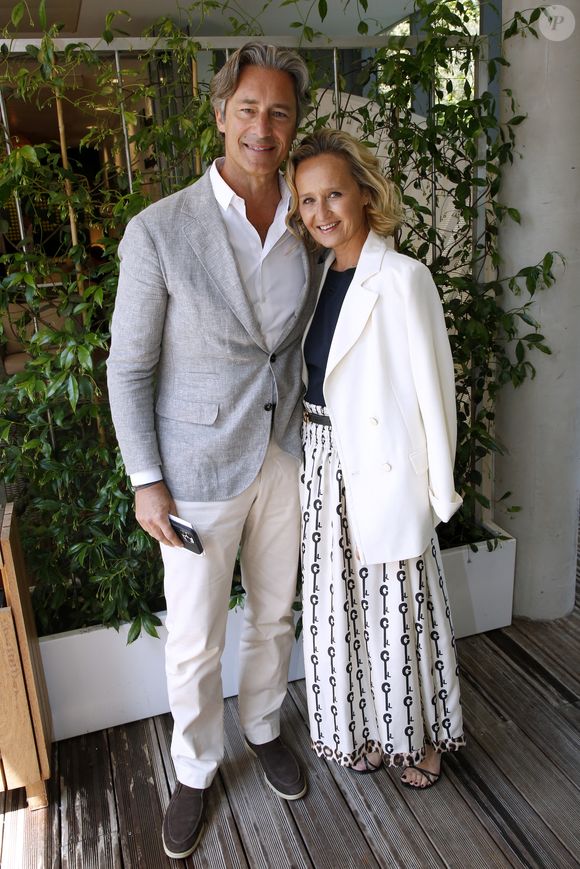 Laurent Solly (Président de Facebook France) et sa femme Caroline Roux  aux Internationaux de France de Tennis de Roland Garros 2023 - Jour 06 - à Paris, France, le 2 juin 2023. © Bertrand Rindoff/Bestimage