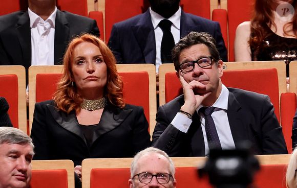Laurent Gerra et Christelle Bardet pendant la cérémonie de remise du prix lumière à I.Huppert lors de la 16ème édition du Festival Lumière à l'Amphithéâtre - Centre de Congrès à Lyon, France, le 18 octobre 2024. © Dominique Jacovides/Bestimage