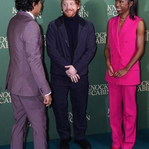 De gauche à droite, M. Night Shyamalan, Rupert Grint et Nikki Amuka-Bird arrivant à la projection spéciale de "Knock at the Cabin", au Vue West End à Londres, le mercredi 25 janvier 2023.