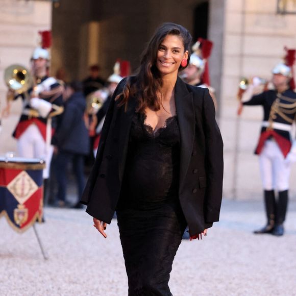 Tatiana Silva (enceinte, ancienne miss Belgique) arrivant au dîner d'état au palais de l'Elysée à Paris en l'honneur de la visite du roi et de la reine de Belgique en France le 14 octobre 2024.

© Dominique Jacovides / Bestimage